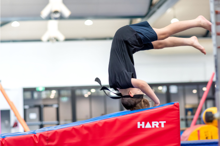 Ninja participant doing a forward roll