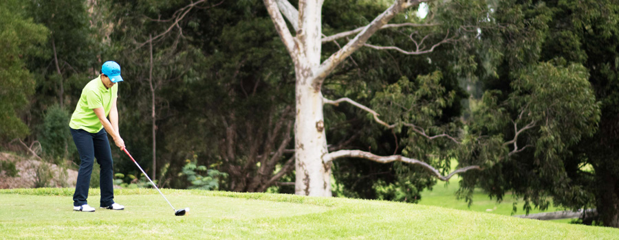 Person teeing off