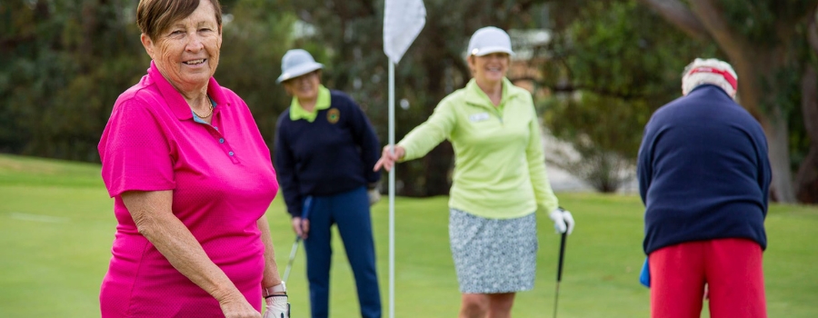 Group of women playing golf